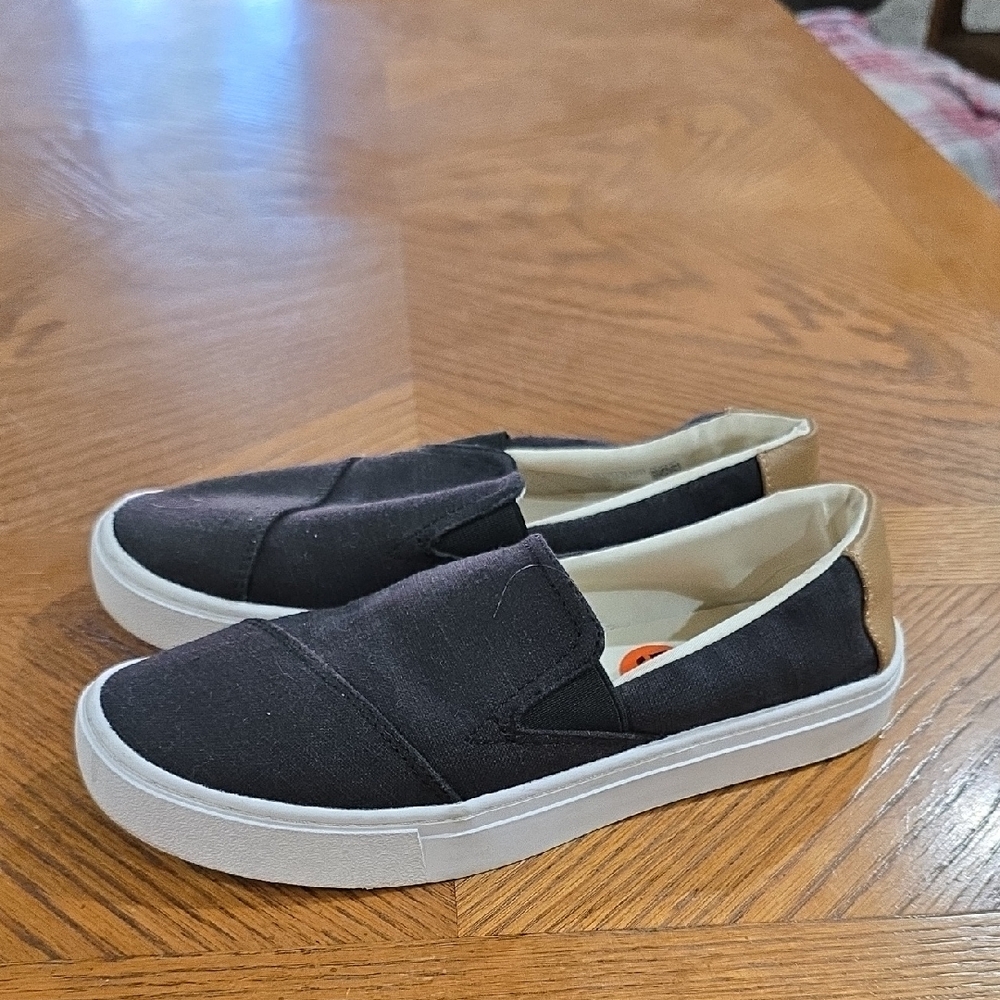 Toms Black Slip-On Flats with Tan Heel
